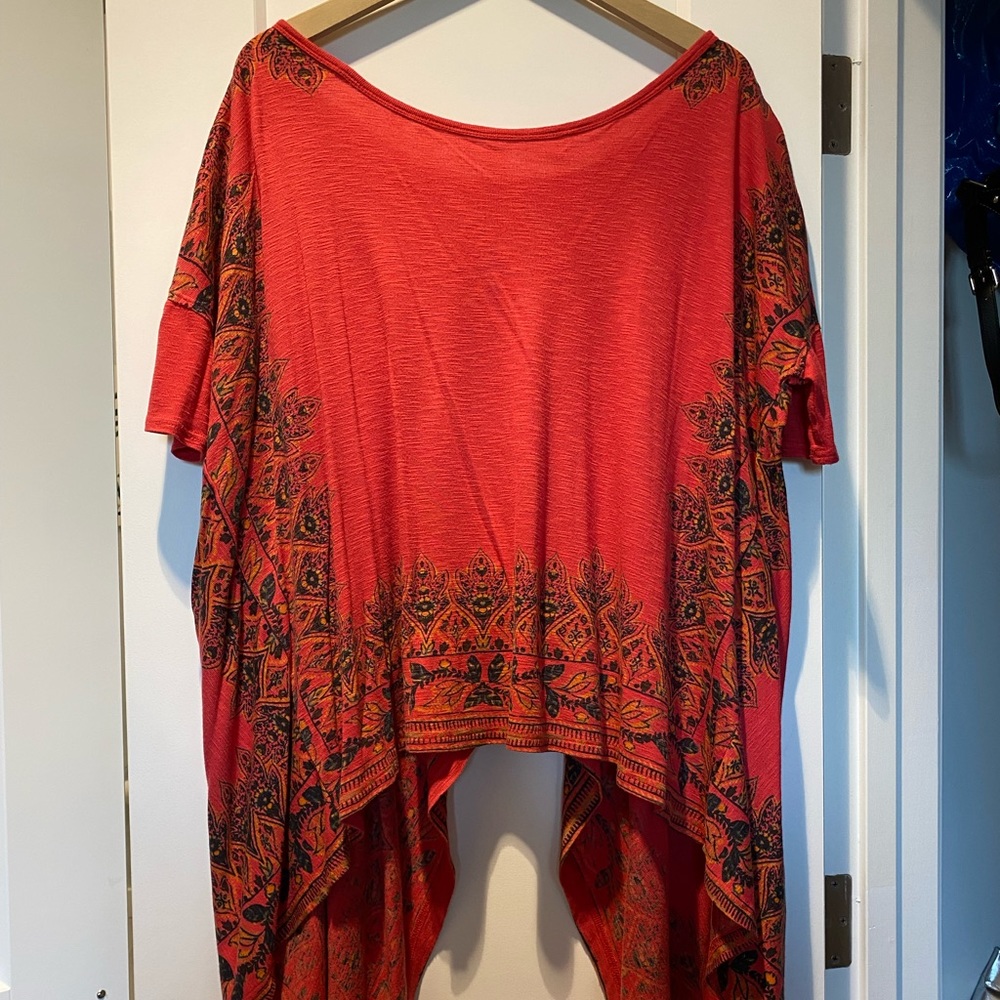 Brand: Free People
Color: burnt orange
Size: small
Fit: oversized
